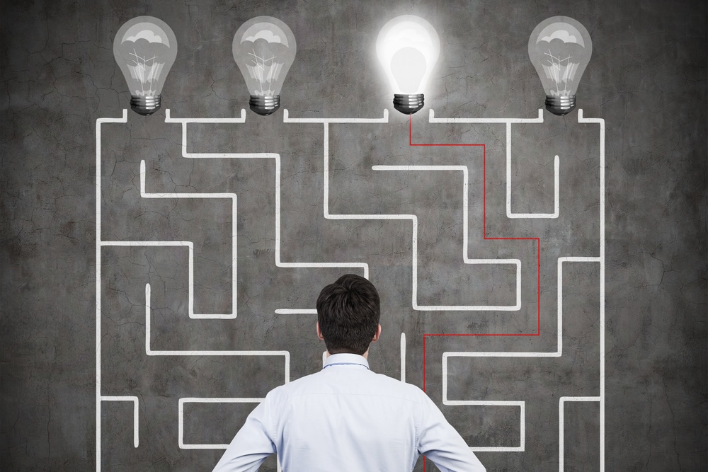 Confused,Businessman,Brainstorming,The,Labyrinth,To,Find,The,Solution
